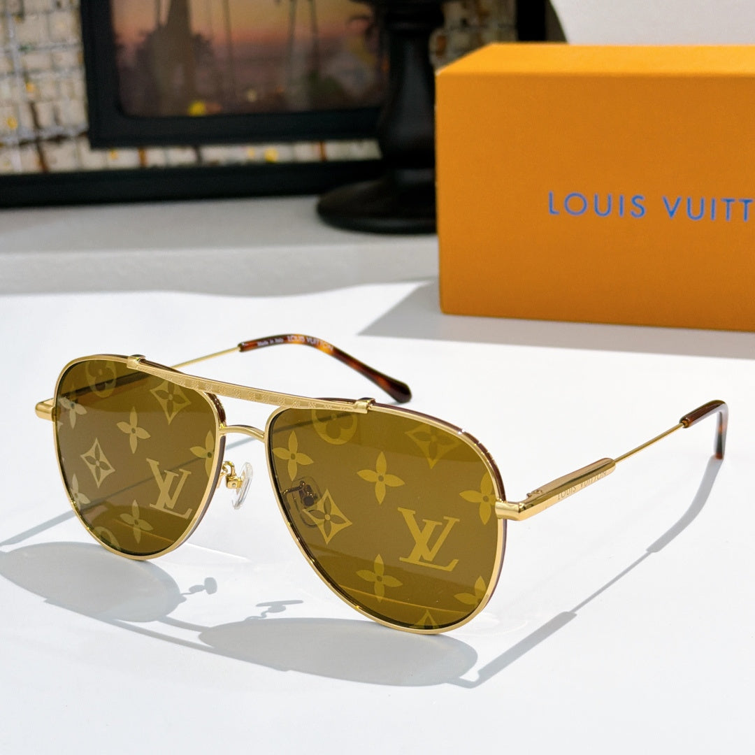 Louis Vuitton sunglasses with gold frame and LV monogram patterned amber lenses