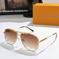 Louis Vuitton sunglasses with gold frame and brown gradient lenses