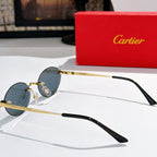 Cartier round sunglasses side view with gold frame and dark blue tinted lenses.