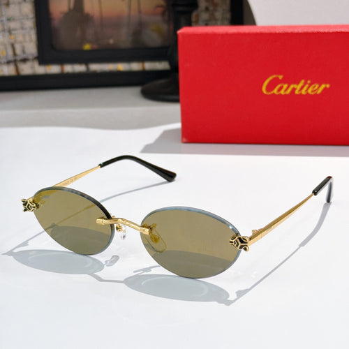 Cartier round sunglasses with black arms and gold frame, olive tinted lenses.