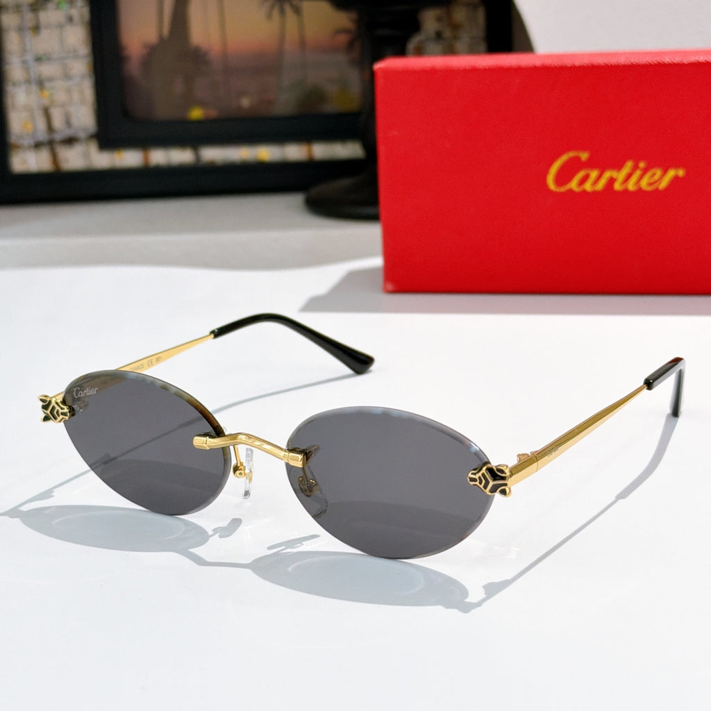 Cartier round sunglasses with gold frame and dark gray lenses, black arms.