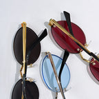 Cartier sunglasses close-up with gold temples and glossy lens colors in stacked views.