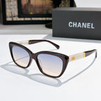 Tortoiseshell cat-eye sunglasses with light-tinted lenses and gold temple accents