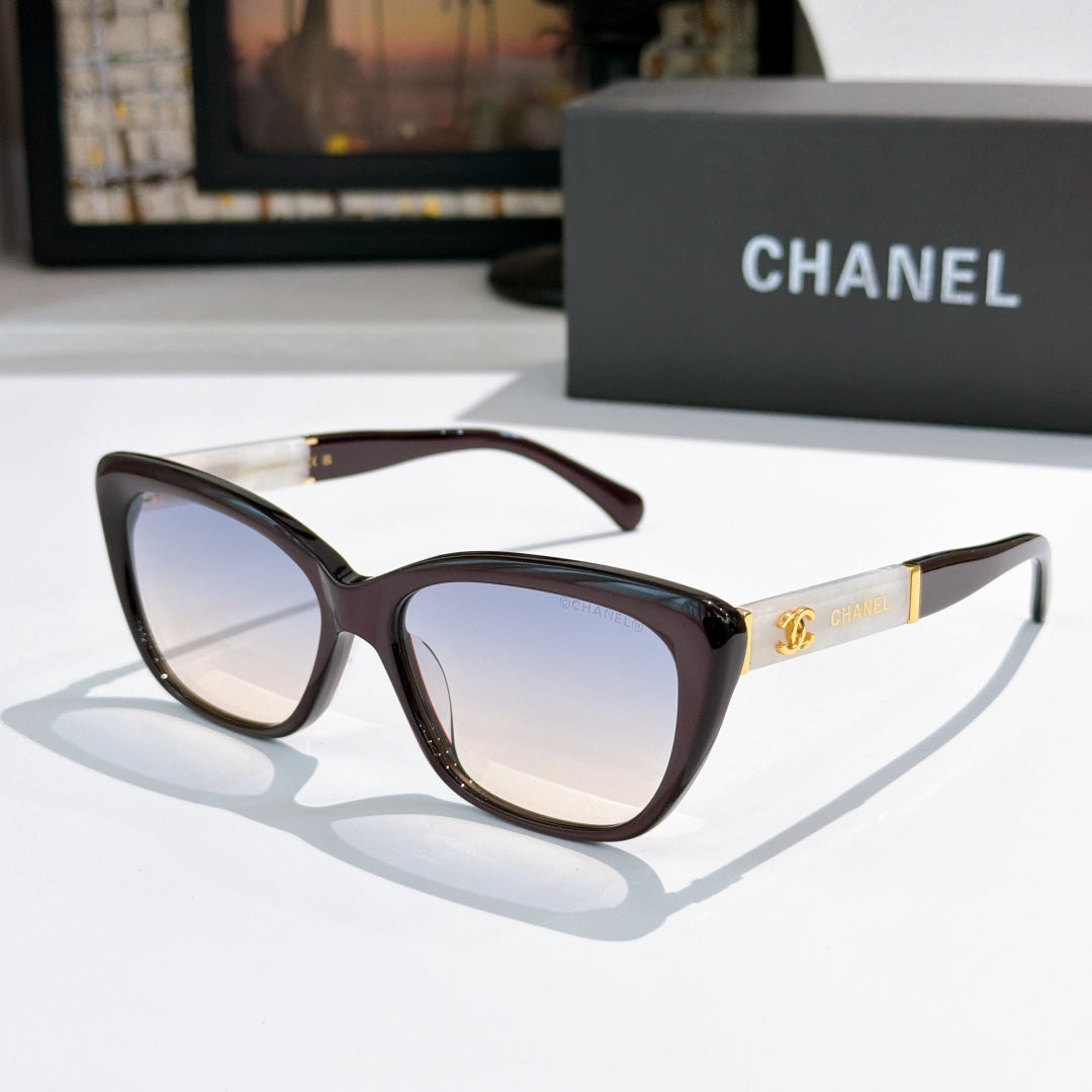 Tortoiseshell cat-eye sunglasses with light-tinted lenses and gold temple accents