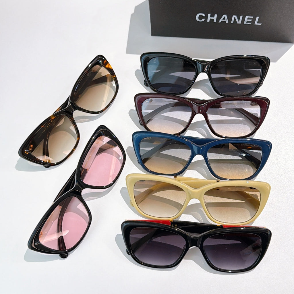 Assorted cat-eye glasses with multiple frame colors and tinted lenses