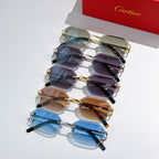 Assorted Cartier sunglasses with tinted lenses and gold frames in blue, brown, and purple
