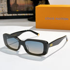 Louis Vuitton sunglasses with black frames, light blue lenses, gold-tone tips.
