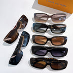 Louis Vuitton sunglasses assortment with multiple frames and colored lenses.