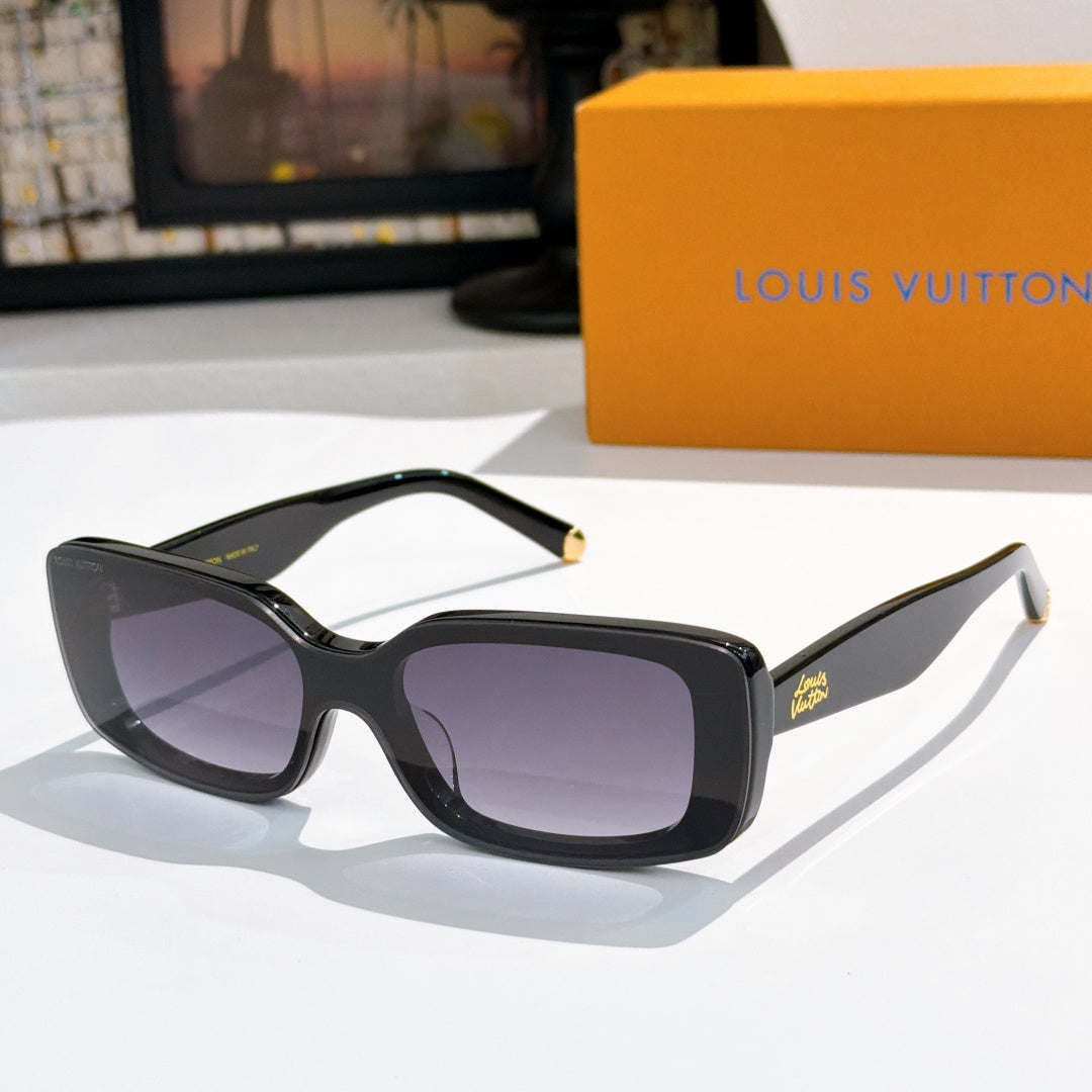 Louis Vuitton sunglasses with black frames, purple-tinted lenses, gold-tone tips.