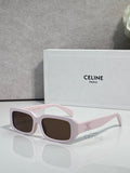 Celine sunglasses with white frame, pale pink temples, and dark lenses