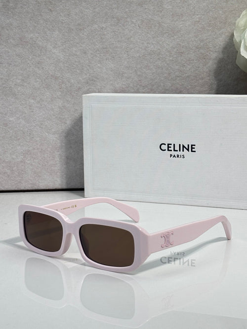 Celine sunglasses with white frame, pale pink temples, and dark lenses