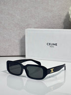 Celine sunglasses with dark navy frame, oversized square lenses, and gold logo