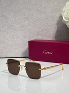 Cartier optical glasses with gold metal frame and dark brown-tinted lenses