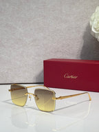 Cartier optical glasses with gold metal frame and yellow-tinted lenses