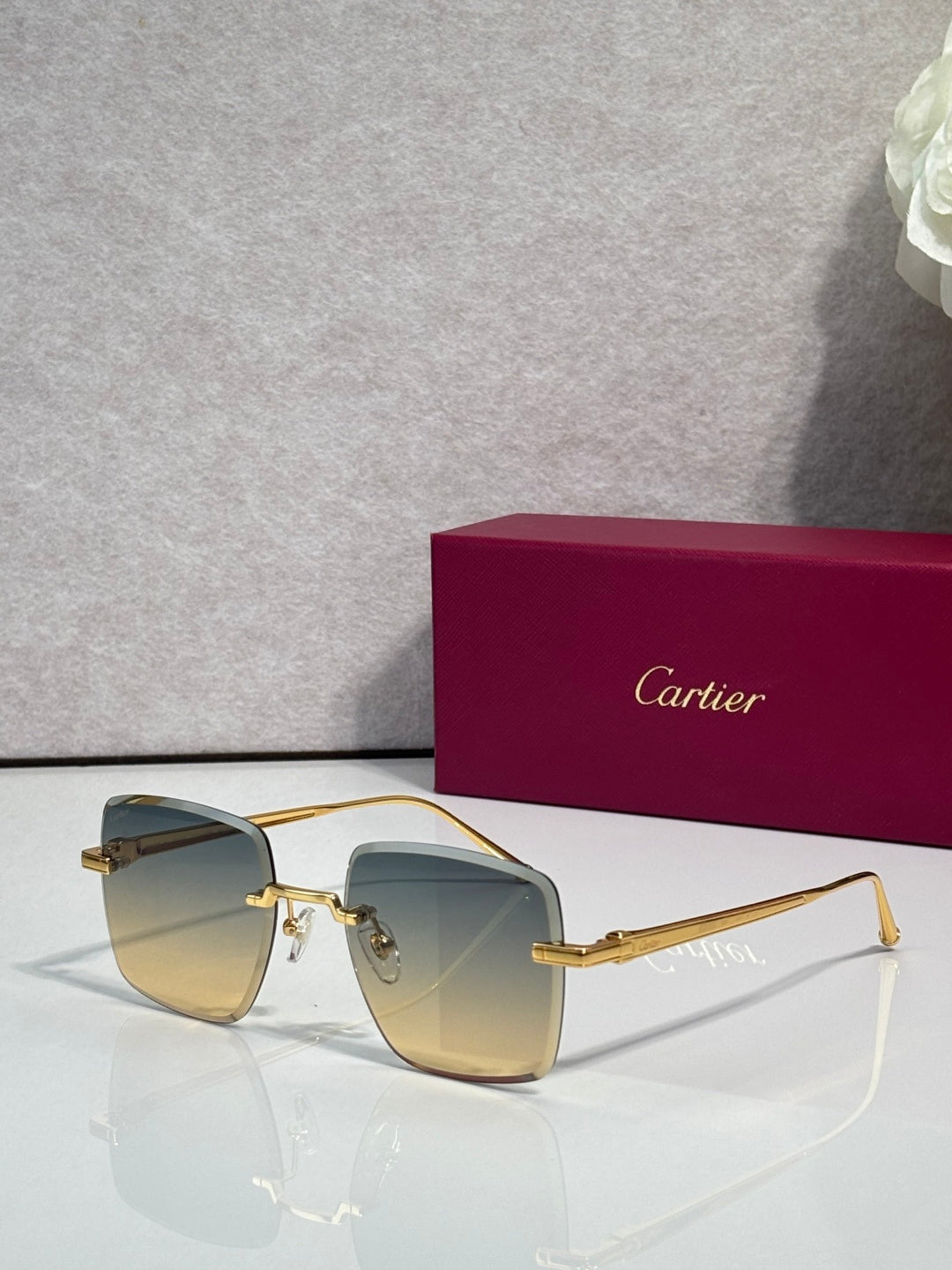 Cartier optical glasses with gold metal frame and light amber-tinted lenses