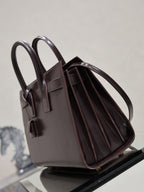 YSL dark brown leather tote bag with open top and striped interior lining