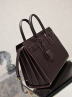 YSL dark brown leather tote bag with pleated side panels and top handles