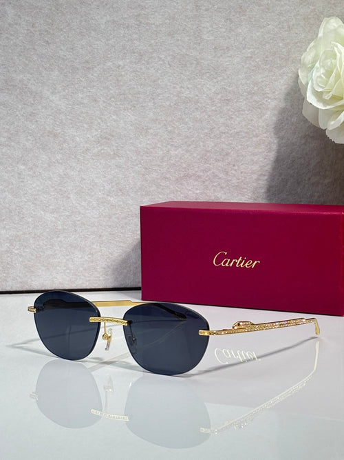 Gold-tone metal sunglasses with dark lenses and round-oval shape