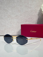 Aviator sunglasses with gold-tone metal frame and dark blue tinted lenses