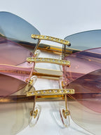 Rhinestone top bar on gold-tone aviator glasses with multicolor tinted lenses