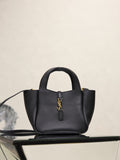 YSL black leather mini tote bag with top handles and gold logo plaque