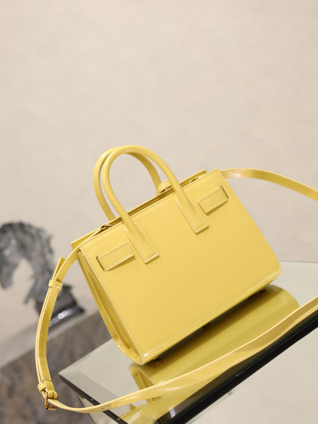YSL mini handbag with top handles, glossy yellow, front flap and detachable shoulder strap