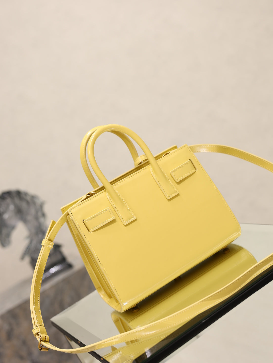 YSL mini handbag with top handles, glossy yellow, front flap and detachable shoulder strap