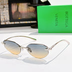 Silver-tone sunglasses with blue-tinted lenses and slim metal temples.