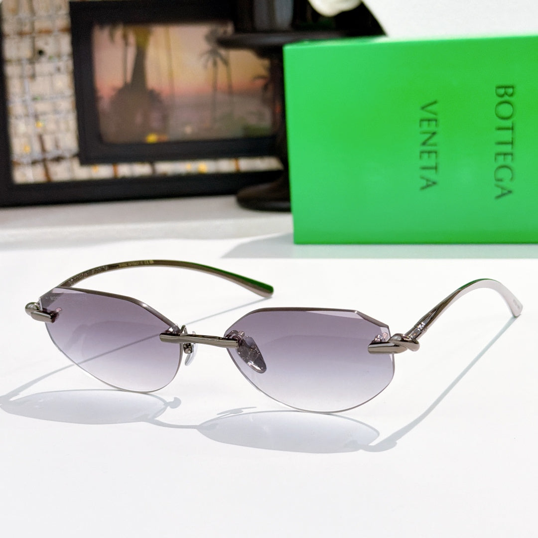 Silver-tone sunglasses with purple-tinted lenses and metal bridge detail.