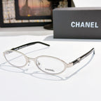 Chanel eyeglasses, silver frame with clear lenses and oval round silhouette