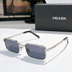 Prada sunglasses with dark lenses and silver-tone rectangular frames