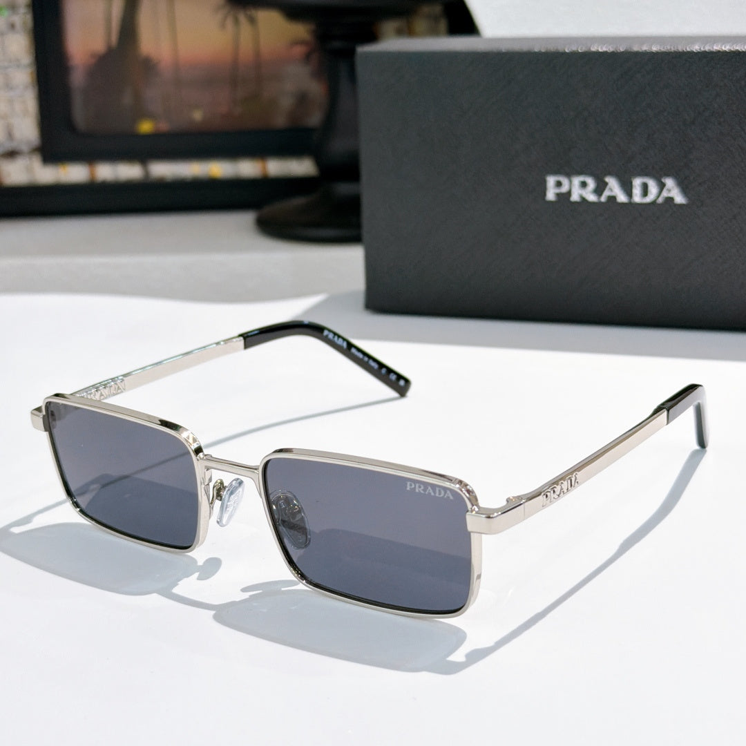 Prada sunglasses with dark lenses and silver-tone rectangular frames