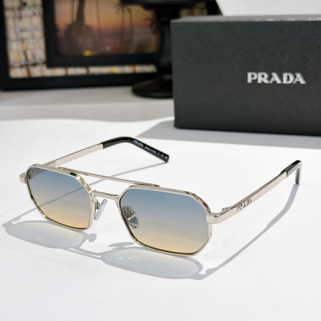 Prada sunglasses with silver frame and light blue-tinted lenses