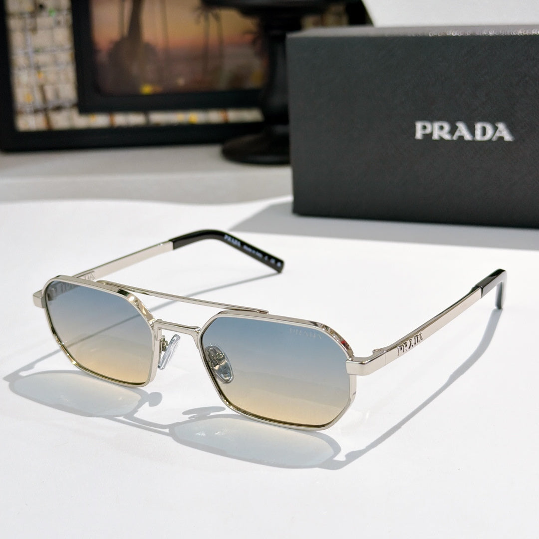 Prada sunglasses with silver frame and light blue-tinted lenses