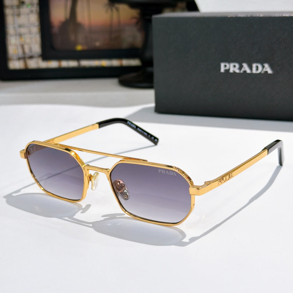 Prada sunglasses with gold frame and purple-tinted lenses