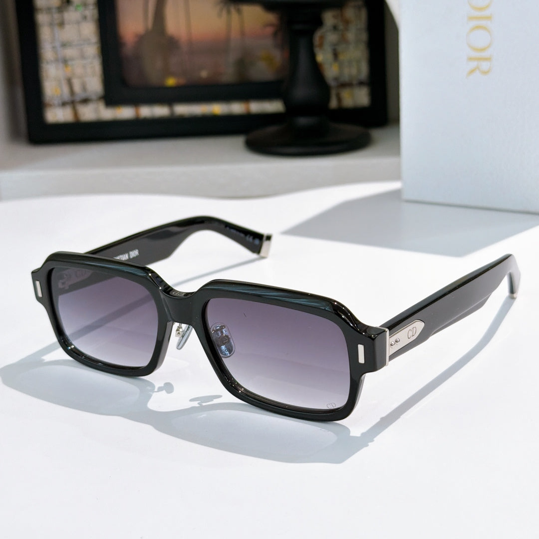 Dior sunglasses with black frames and dark gray tinted lenses