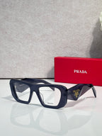 Prada black rectangular eyeglasses with clear lenses and logo-marked temples