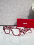 Prada burgundy rectangular eyeglasses with clear lenses and pink-tinted rims
