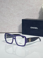 Blue rectangular eyeglasses with CHANEL logo and patterned temple arms