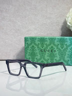 Gucci dark blue rectangular eyeglasses with clear lenses