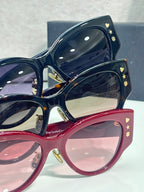 Sunglasses set: dark blue and red frames with gold motifs and tinted lenses