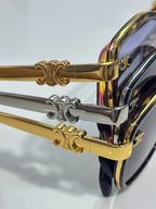 Celine sunglasses close-up showing gold-tone temple hardware and hinge