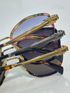 Celine sunglasses close-up with overlapping frames and gold-tone temple accents