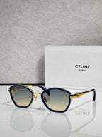 Celine sunglasses with round blue frames and tinted lenses, gold-tone accents
