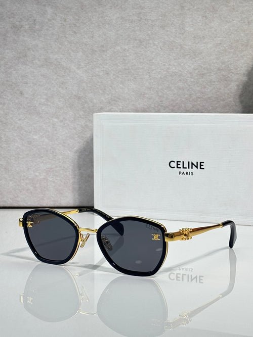 Celine sunglasses with round dark frames and smoky lenses, gold-tone accents