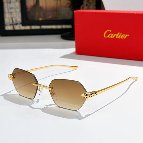 Sunglasses with amber-tinted hexagonal lenses and gold-tone metal frame