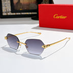 Sunglasses with dark purple hexagonal lenses and gold-tone metal frame