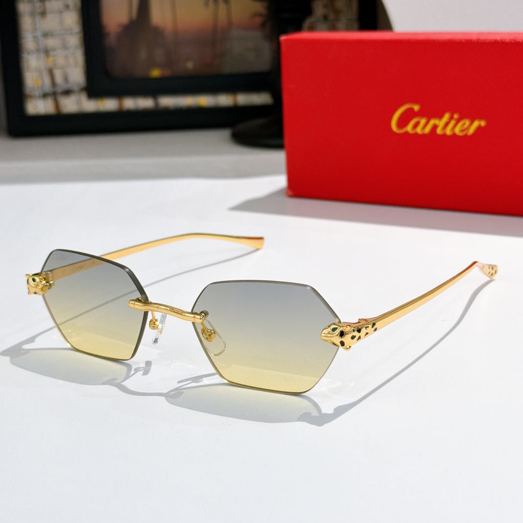 Sunglasses with light yellow hexagonal lenses and gold-tone metal frame