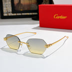 Sunglasses with light yellow hexagonal lenses and gold-tone metal frame