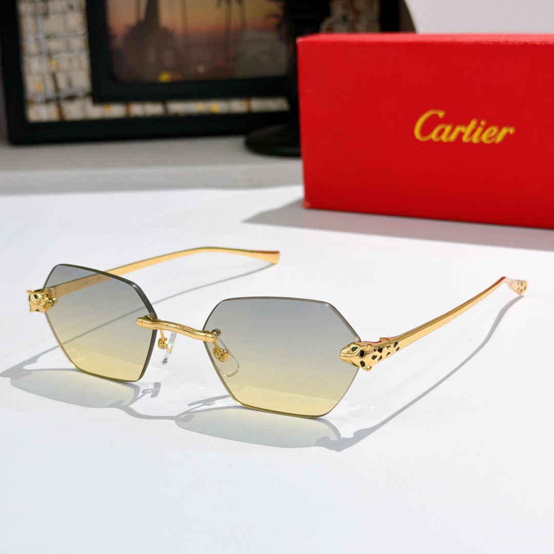 Sunglasses with light yellow hexagonal lenses and gold-tone metal frame